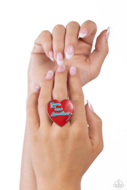 As I Have Loved You Red Inspirational Ring - Paparazzi Accessories  Stamped atop an oversized, red-painted heart, the phrase "Love one Another" is featured in a blue hue. The scripture reference, "John 13:34," curves up one side of the red heart frame in silver letters atop airy silver bands for a religious-inspired centerpiece. Features a stretchy band for a flexible fit.  Sold as one individual ring.  Sku:  P4WD-RDXX-064XX