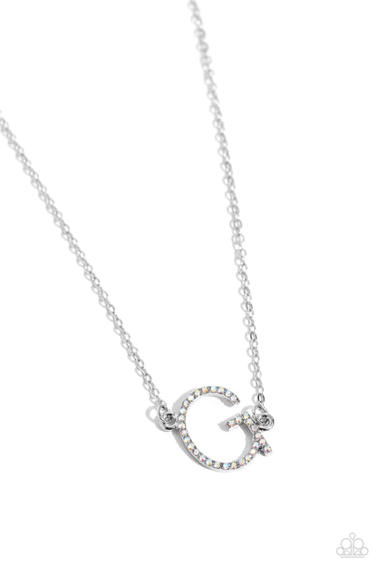 INITIALLY Yours Multi "G" Necklace - Paparazzi Accessories  Embossed with dainty iridescent rhinestones, a silver letter "G" hovers below the collar from a dainty silver chain, for a sentimentally simple design. Features an adjustable clasp closure. Due to its prismatic palette, color may vary.  Sold as one individual necklace. Includes one pair of matching earrings.  P2DA-MTXX-130XX