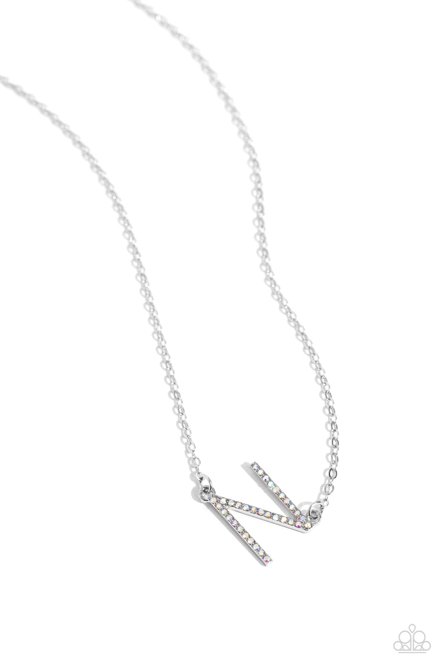INITIALLY Yours Multi "N" Necklace - Paparazzi Accessories  Embossed with dainty iridescent rhinestones, a silver letter "N" hovers below the collar from a dainty silver chain, for a sentimentally simple design. Features an adjustable clasp closure. Due to its prismatic palette, color may vary.  Sold as one individual necklace. Includes one pair of matching earrings.  P2DA-MTXX-137XX
