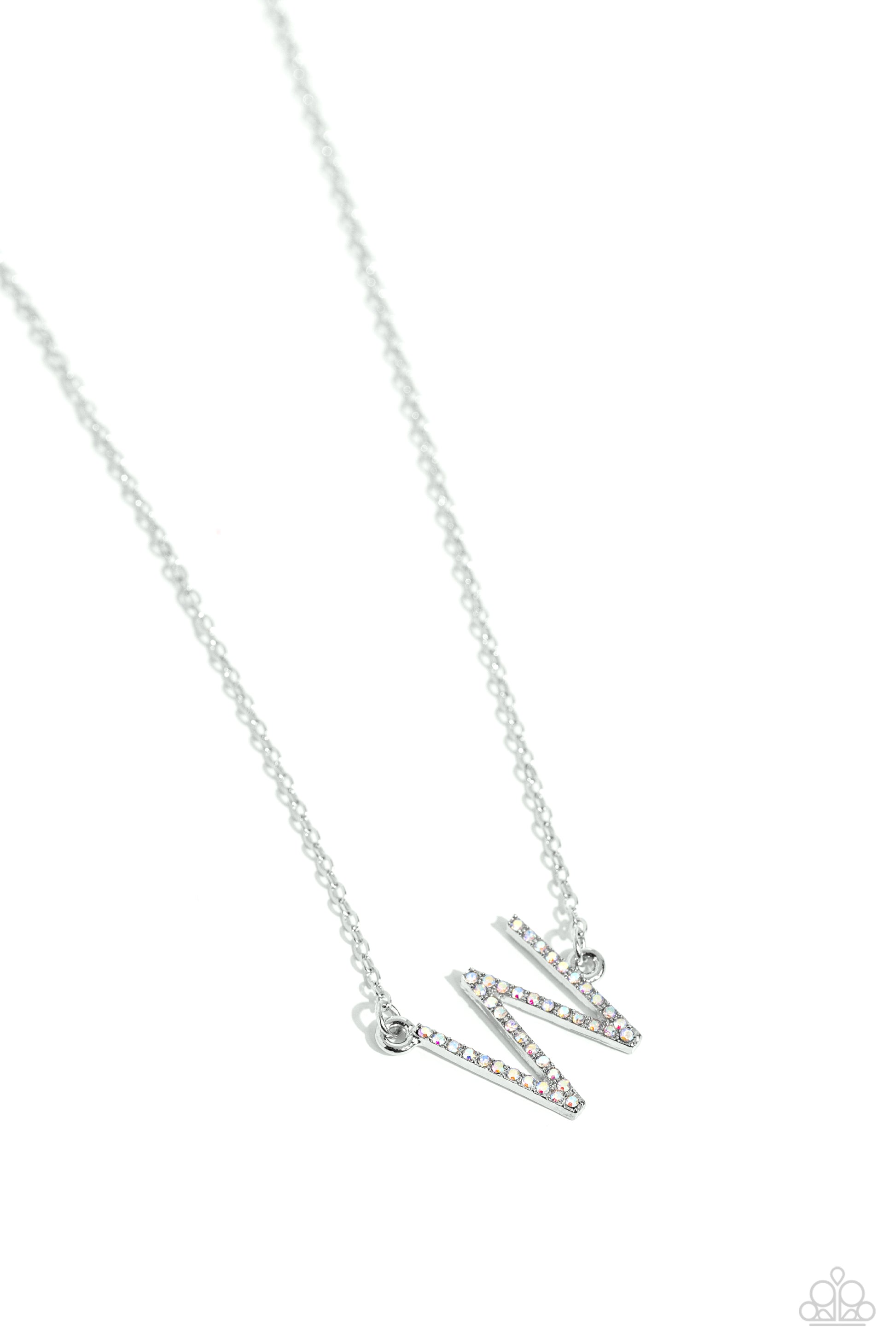 INITIALLY Yours Multi "W" Necklace - Paparazzi Accessories  Embossed with dainty iridescent rhinestones, a silver letter "W" hovers below the collar from a dainty silver chain, for a sentimentally simple design. Features an adjustable clasp closure. Due to its prismatic palette, color may vary.  Sold as one individual necklace. Includes one pair of matching earrings.  P2DA-MTXX-146XX
