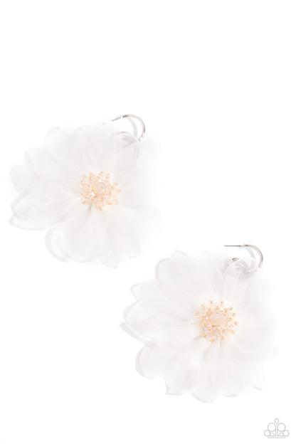 Cosmopolitan Chiffon White Hoop Earring - Paparazzi Accessories  A duo of asymmetrical silver hoops link as they tumble from the ear, coalescing into an abstract lure. Attached to the bottom of the elongated display, oversized white chiffon petals bloom around opalescent-tinted beads, creating a fantastical floral frenzy. Earring attaches to a standard post fitting. Hoop measures approximately 1" in diameter. Due to its prismatic palette, color may vary.  Sold as one pair of hoop earrings.  P5HO-WTXX-157XX