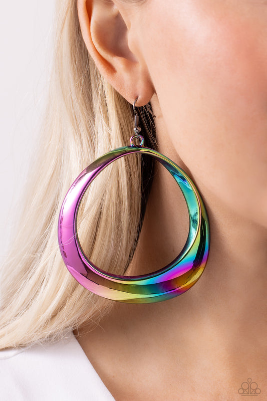 Asymmetrical Action Multi Oil Spill Earring - Paparazzi Accessories  An oversized warped oil spill ring swings from the bottom of the ear, creating an asymmetrical centerpiece. Earring attaches to a standard fishhook fitting.  Featured inside The Preview at Made for More! Sold as one pair of earrings.  Sku:  P5BA-MTXX-027XX