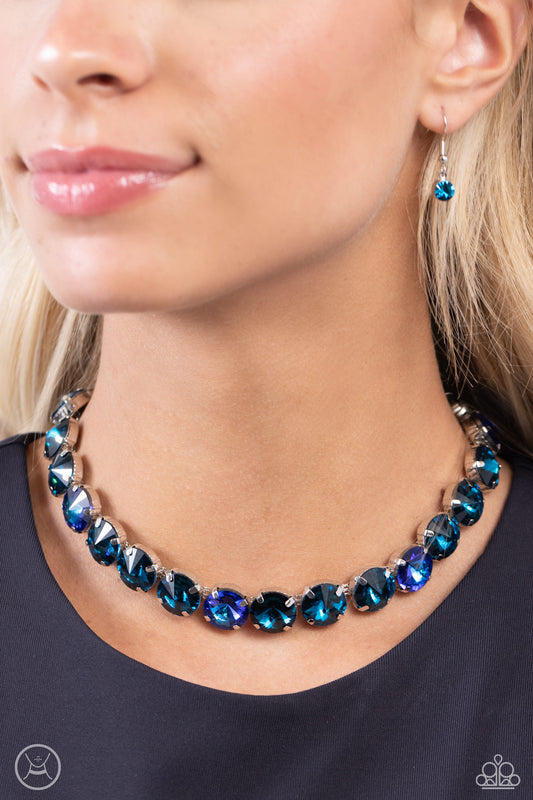 Alluring A-Lister Blue Rhinestone Choker Necklace - Paparazzi Accessories  Featuring various shades of blue, a collection of faceted gems in pronged silver fittings come to a point as they coalesce around the collar for a dramatically refined display. Features an adjustable clasp closure.  Sold as one individual choker necklace. Includes one pair of matching earrings.  Sku:  P2CH-BLXX-043XX