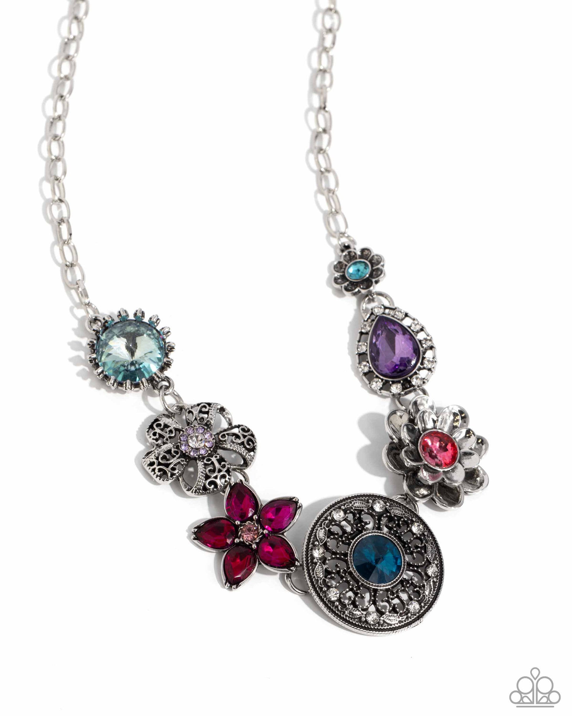 Giddy Garden Multi Flower Necklace (March 2024 LOP) - Paparazzi Accessories A variety of floral-inspired pendants featuring intricate detailing. Silver flowers featuring colorful gem centers and petals, followed by an airy filigree flower with a glistening rhinestone center. Two faceted round and teardrop gems are encircled by classic white rhinestones. Silver and white rhinestones radiate from a blue gem, creating the centermost pendant. Includes one pair of matching earrings. SKU: P2ST-MTXX-141XX