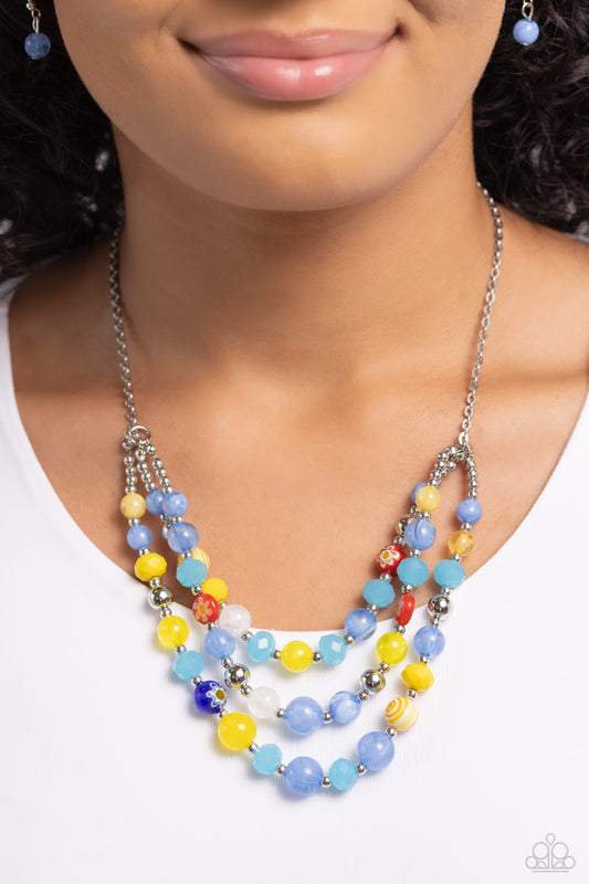Summer Scope Blue Necklace - Paparazzi Accessories  Attached and separated by shiny silver beads, three rows of alternating vibrant multicolored beads, silver studs, and floral-inspired beads layer across the collar, creating a colorful canvas. Features an adjustable clasp closure.  Sold as one individual necklace. Includes one pair of matching earrings.  Sku:  P2ST-BLXX-232XX