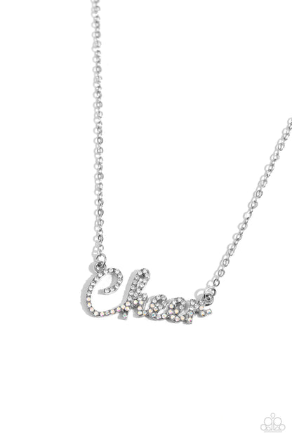 Cheer Squad White Necklace - Paparazzi Accessories  Curled in a script font, glistening silver letters spell out the word "Cheer" along a dainty silver chain. Embossed on the letters, dainty white rhinestones and iridescent rhinestones create a subtle ombré effect for a peppy finish. Features an adjustable clasp closure. Due to its prismatic palette, color may vary.  Sold as one individual necklace. Includes one pair of matching earrings.  P2WD-WTXX-276XX