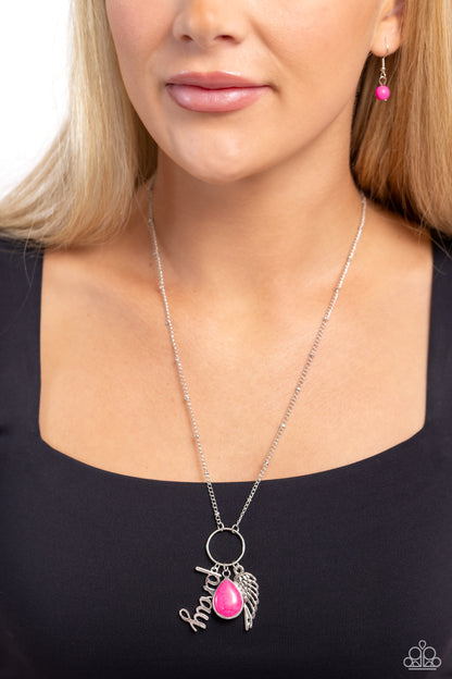 Angelic Artistry Pink Inspirational Necklace - Paparazzi Accessories  Accented with a silver satellite chain, a pink stone pressed in a silver teardrop, the silver word "pray," and an ornate half-angel silver wing cascade from the bottom of a silver ring, creating an angelic display. Features an adjustable clasp closure.  Sold as one individual necklace. Includes one pair of matching earrings.  Sku:  P2WD-PKXX-201XX