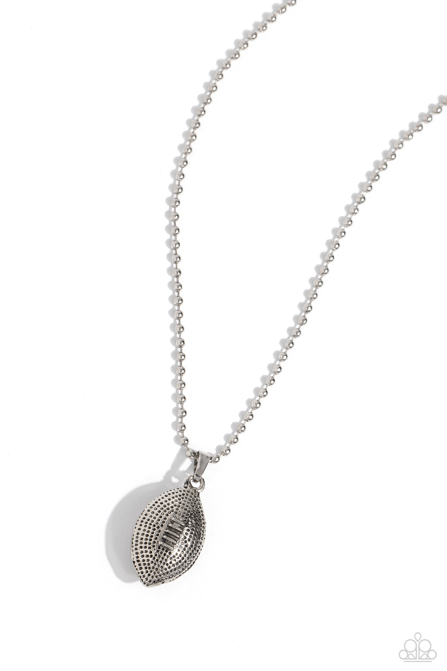Timeless Tackle Silver Football Necklace - Paparazzi Accessories  Featuring a dot motif, a thick silver football pendant glides along a silver ball chain for a touchdown tribute. Features an adjustable clasp closure.  Sold as one individual necklace. Includes one pair of matching earrings.  P2DA-SVXX-406XX