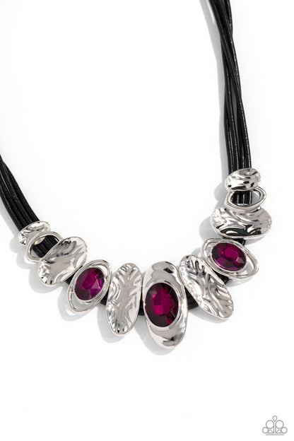 Sliding Splendor Pink Necklace - Paparazzi Accessories  Featuring a lightly hammered sheen, asymmetrical silver ovals, some with airy silhouettes and exaggerated fuchsia gem centers, give off a hand-made feel as they shift and slide through multiple strands of black cording for an artisanal design below the collar. Features an adjustable clasp closure.  Sold as one individual necklace. Includes one pair of matching earrings.  Sku:  P2RE-PKXX-409XX