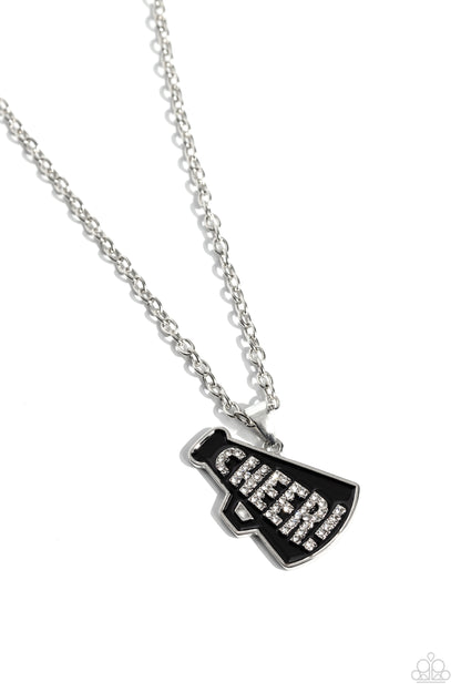 Cheer Champion Black Necklace - Paparazzi Accessories  Outlined in glistening white rhinestones, the word "Cheer!" is embossed in the center of a black-painted megaphone pendant along a dainty silver chain for a sports-inspired statement. Features an adjustable clasp closure.  Sold as one individual necklace. Includes one pair of matching earrings.  P2WD-BKXX-194XX