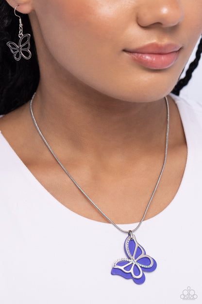 Detailed Dance Blue Butterfly Necklace - Paparazzi Accessories  Layered beside a silver butterfly silhouette dotted with aquamarine and blue-iridescent rhinestones, a royal blue-painted acrylic butterfly flutters from a silver snake chain below the collar for a whimsical fashion. Features an adjustable clasp closure. Due to its prismatic palette, color may vary.  Sold as one individual necklace. Includes one pair of matching earrings.  Sku:  P2WH-BLXX-485XX