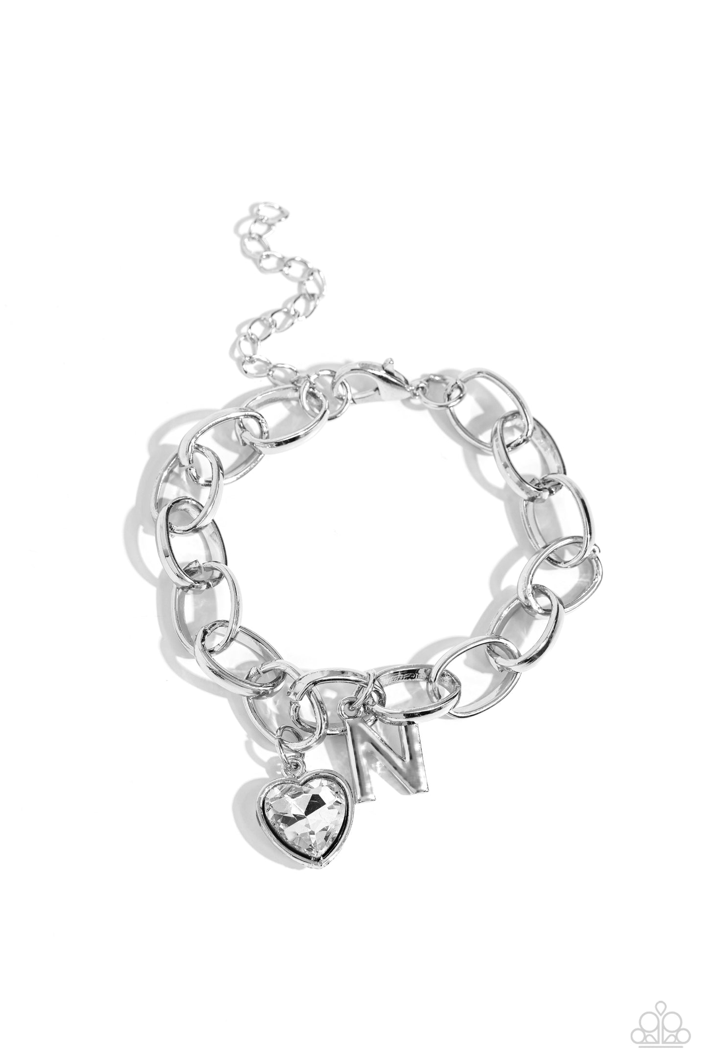 Guess Now Its INITIAL White "N" Bracelet - Paparazzi Accessories  A simple collection of silver charms — including a white rhinestone heart pressed in a silver frame and a sleek letter "N" — dance from a chunky silver chain around the wrist, creating a sentimental fringe. Features an adjustable clasp closure.  Sold as one individual bracelet.  New Kit Sku:  P9BA-WTXX-048XX
