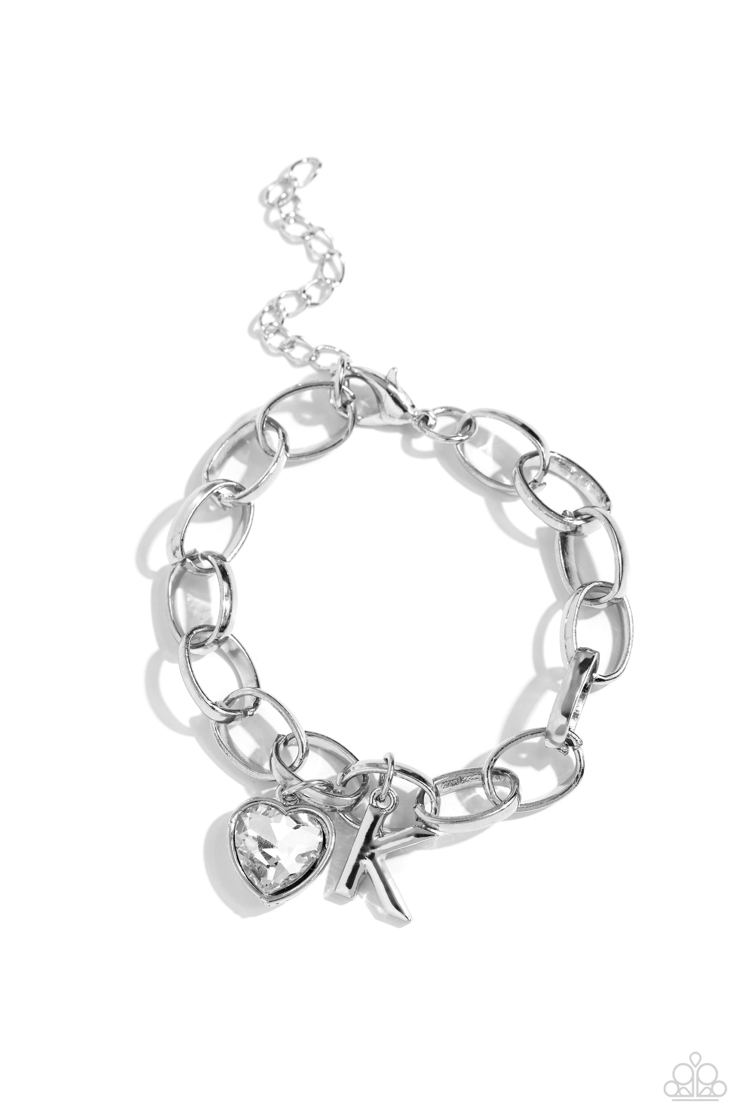 Guess Now Its INITIAL White "K" Bracelet - Paparazzi Accessories  A simple collection of silver charms — including a white rhinestone heart pressed in a silver frame and a sleek letter "K" — dance from a chunky silver chain around the wrist, creating a sentimental fringe. Features an adjustable clasp closure.  Sold as one individual bracelet.  New Kit Sku:  P9BA-WTXX-045XX