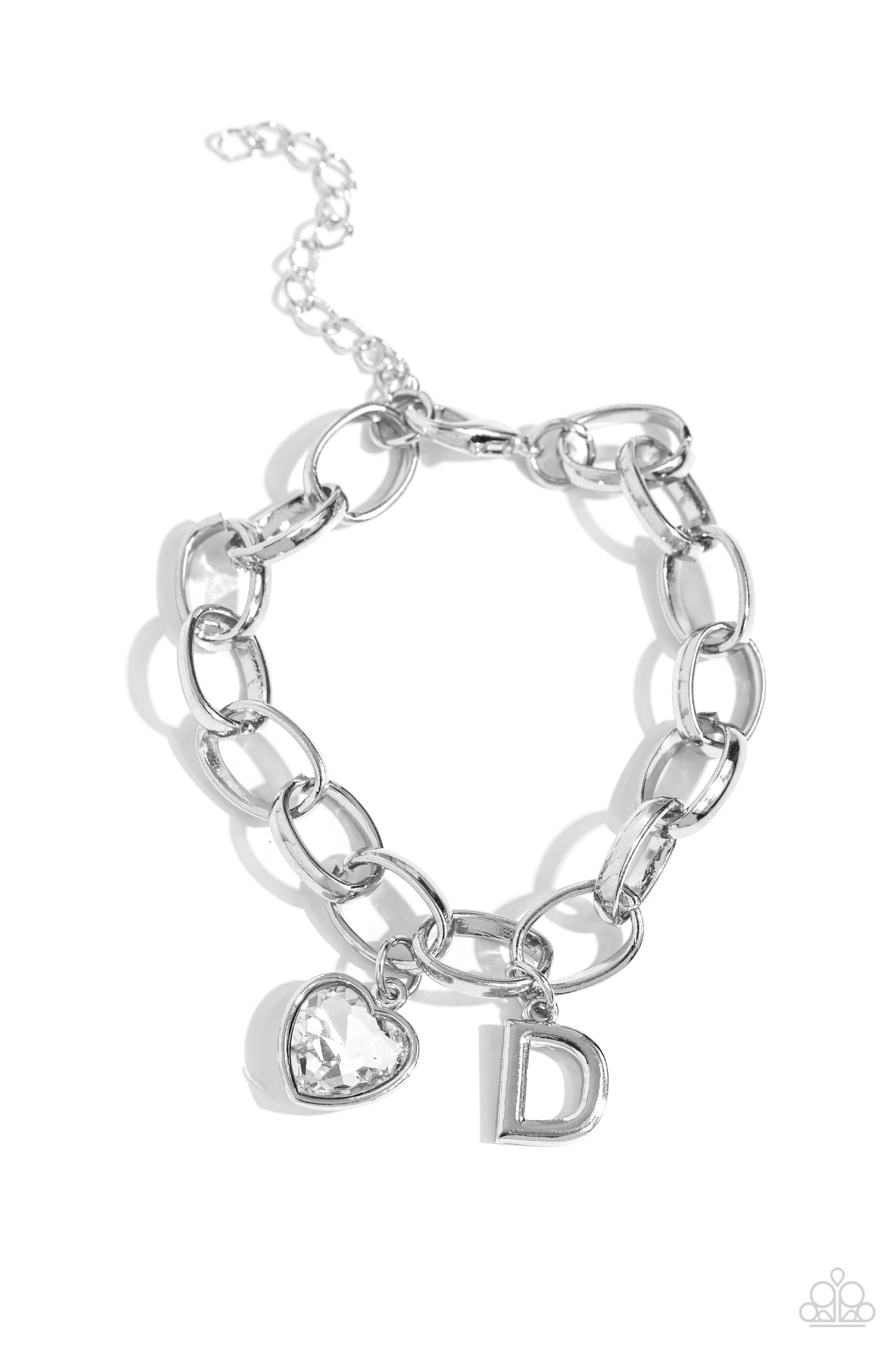 Guess Now Its INITIAL White "D" Bracelet - Paparazzi Accessories  A simple collection of silver charms — including a white rhinestone heart pressed in a silver frame and a sleek letter "D" — dance from a chunky silver chain around the wrist, creating a sentimental fringe. Features an adjustable clasp closure.  Sold as one individual bracelet.  New Kit Sku:  P9BA-WTXX-038XX