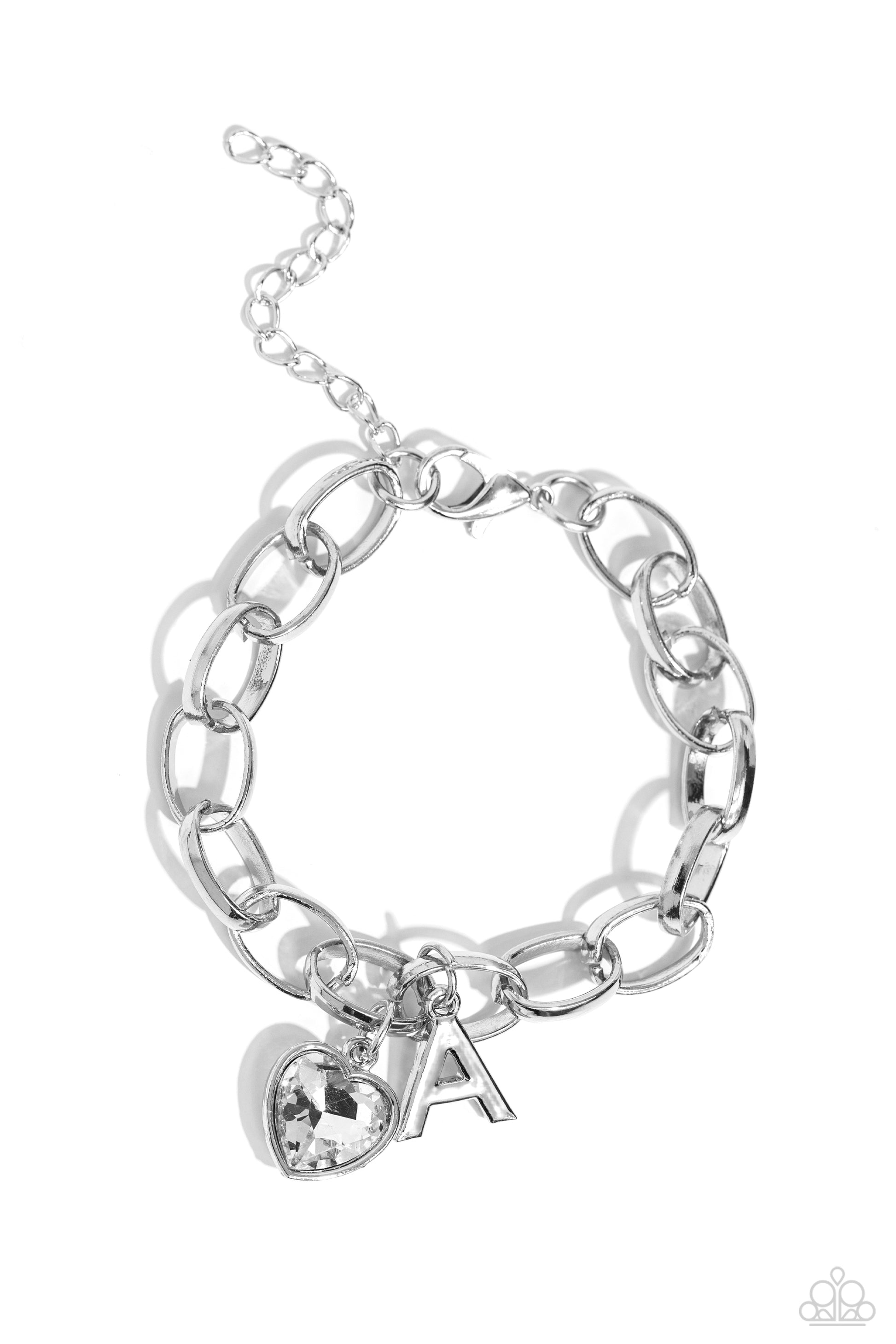 Guess Now Its INITIAL White "A" Bracelet - Paparazzi Accessories  A simple collection of silver charms — including a white rhinestone heart pressed in a silver frame and a sleek letter "A" — dance from a chunky silver chain around the wrist, creating a sentimental fringe. Features an adjustable clasp closure.  Sold as one individual bracelet.  New Kit Sku:  P9BA-WTXX-035XX