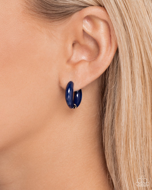 Pivoting Paint Blue Hinge Hoop - Paparazzi Accessories  Featuring spots of navy paint, a silver hinge hoop curls around the ear for a pop of seasonal color. Earring attaches to a standard hinge closure fitting. Hoop measures approximately 1/2" in diameter.  Sold as one pair of hoop earrings.  P5HO-BLXX-066XX