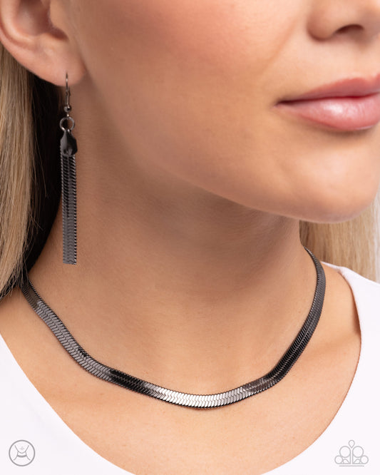 Musings Moment Black Choker Necklace - Paparazzi Accessories   Featuring a sleek gunmetal finish, a herringbone chain loops below the collar for a bold basic. Features an adjustable clasp closure. Sold as one individual choker necklace. Includes one pair of matching earrings.  SKU: P2CH-BKXX-105XX