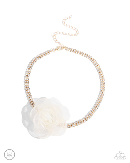 Rosy Range Gold Choker Necklace - Paparazzi Accessories A double-stranded gold chain is embellished with two rows of glistening white rhinestones as it wraps around the collar. An ivory tulle rosette is placed in the center of the design for a floral finish. Features an adjustable clasp closure. Sold as one individual choker necklace. Includes one pair of matching earrings. SKU: P2CH-GDXX-133XX