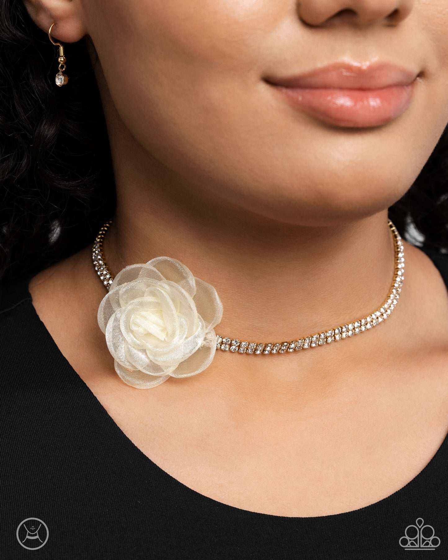 Rosy Range Gold Choker Necklace - Paparazzi Accessories A double-stranded gold chain is embellished with two rows of glistening white rhinestones as it wraps around the collar. An ivory tulle rosette is placed in the center of the design for a floral finish. Features an adjustable clasp closure. Sold as one individual choker necklace. Includes one pair of matching earrings. SKU: P2CH-GDXX-133XX