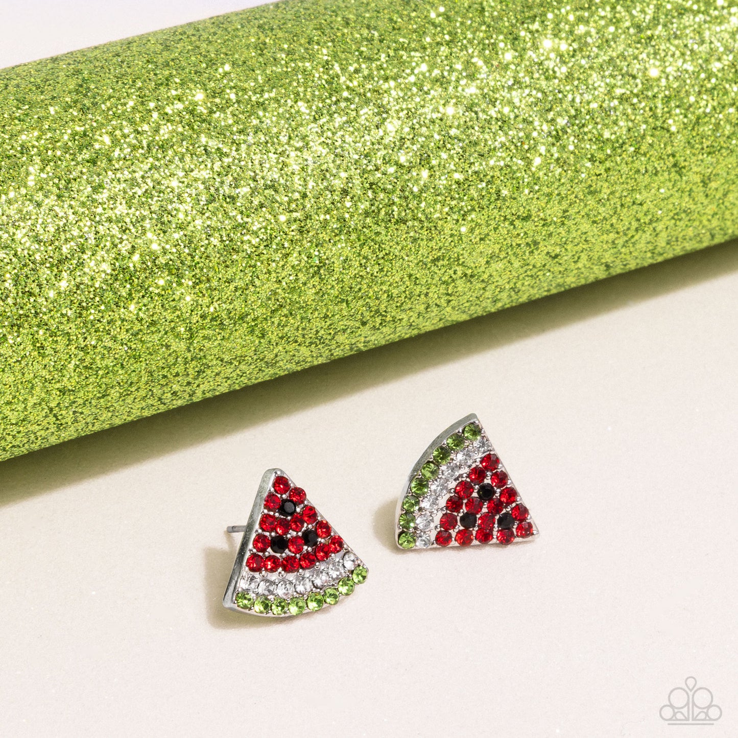 Watermelon Slice Red Post Earring - Paparazzi Accessories  Featuring red, black, white, and green rhinestones, a silver watermelon-inspired post glitters from the ear for a fresh, fruity design. Earring attaches to a standard post fitting. Sold as one pair of post earrings.  SKU: P5PO-RDXX-058XX