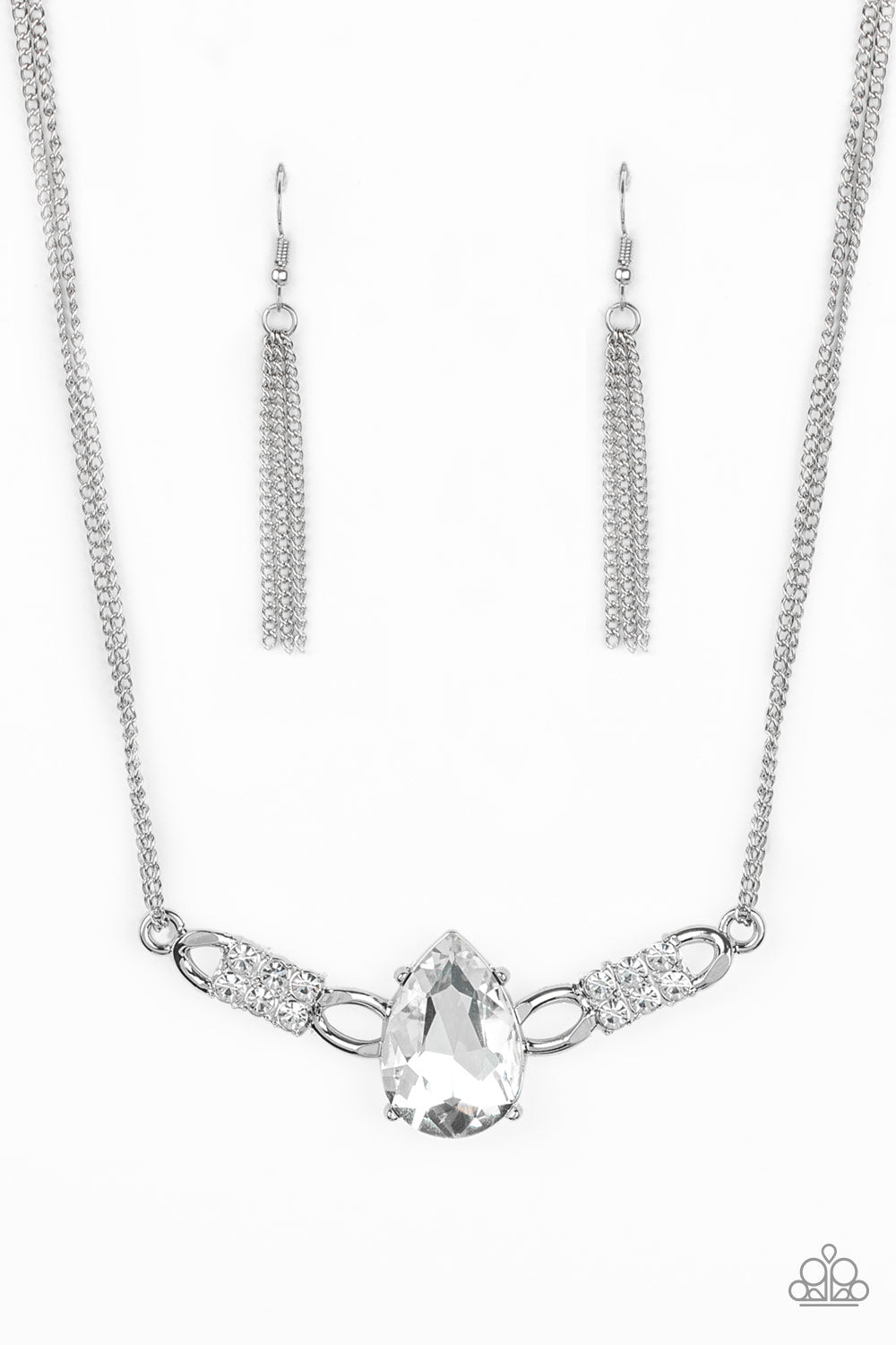 Way To Make An Entrance White Necklace - Paparazzi Accessories Item #JJG-N202 Cut into an alluring teardrop, an oversized white rhinestone gem attaches to bold silver frames radiating with glassy white rhinestones. The dramatic pendant attaches to doubled silver chains, swinging horizontally below the collar in a glamorous fashion. Features an adjustable clasp closure. All Paparazzi Accessories are lead free and nickel free!  Sold as one individual necklace. Includes one pair of matching earrings.