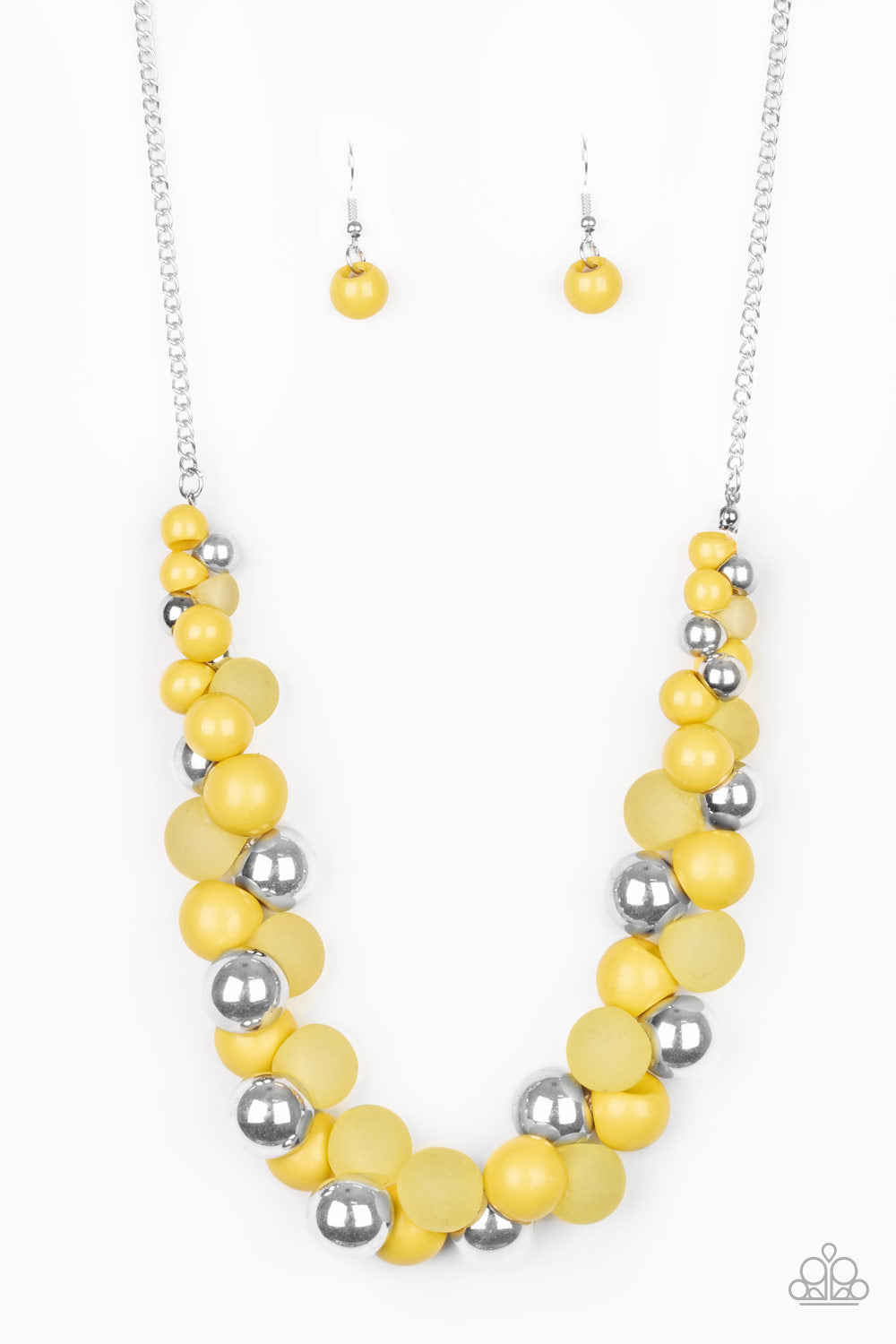Bubbly Brilliance - Yellow Item #N737 A bubbly collection of imperfect silver, opaque, and yellow beads are threaded along an invisible wire below the collar, creating a colorful cluster. Features an adjustable clasp closure. All Paparazzi Accessories are lead free and nickel free!  Sold as one individual necklace. Includes one pair of matching earrings.