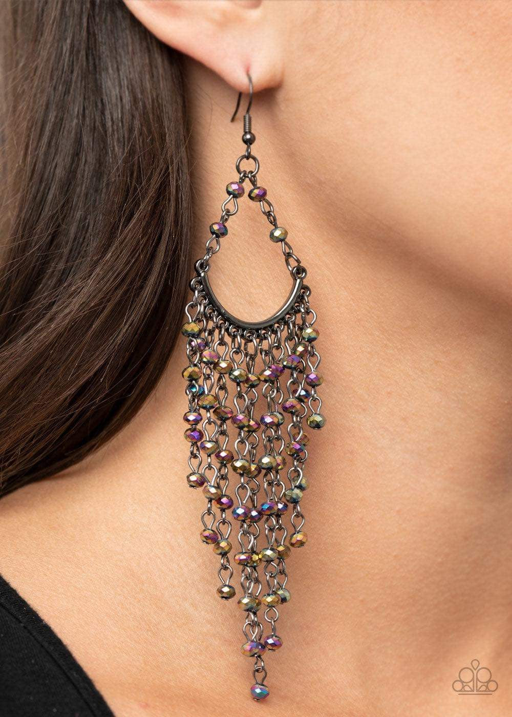 Metro Confetti Multi Earring - Paparazzi Accessories  Oil spill rhinestone beaded tassels cascade from the bottom of a bowing gunmetal bar, creating an ethereal tapered fringe. Earring attaches to a standard fishhook fitting.  Sold as one pair of earrings. This Fan Favorite is back in the spotlight at the request of our 2021 Life of the Party member with Black Diamond Access, Heather L.