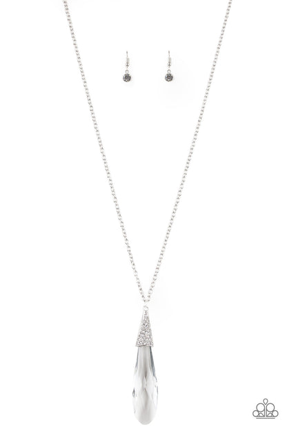 Jaw-Droppingly Jealous White Necklace - Paparazzi Accessories  Item #P2RE-WTXX-415XX Capped in a silver frame radiating with glittery white rhinestones, a glassy teardrop pendant swings from the bottom of a lengthened silver chain for a jaw-dropping look. Features an adjustable clasp closure.  Sold as one individual necklace. Includes one pair of matching earrings.